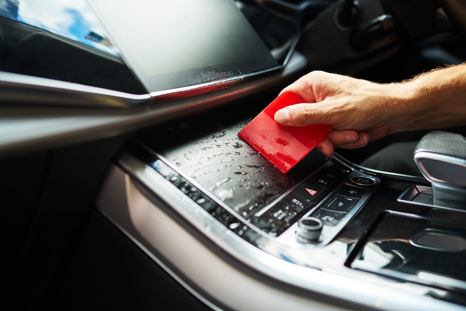 Car touchscreen infotainment screen protector with anti-glare, anti-fingerprint and scratch-resistant features.