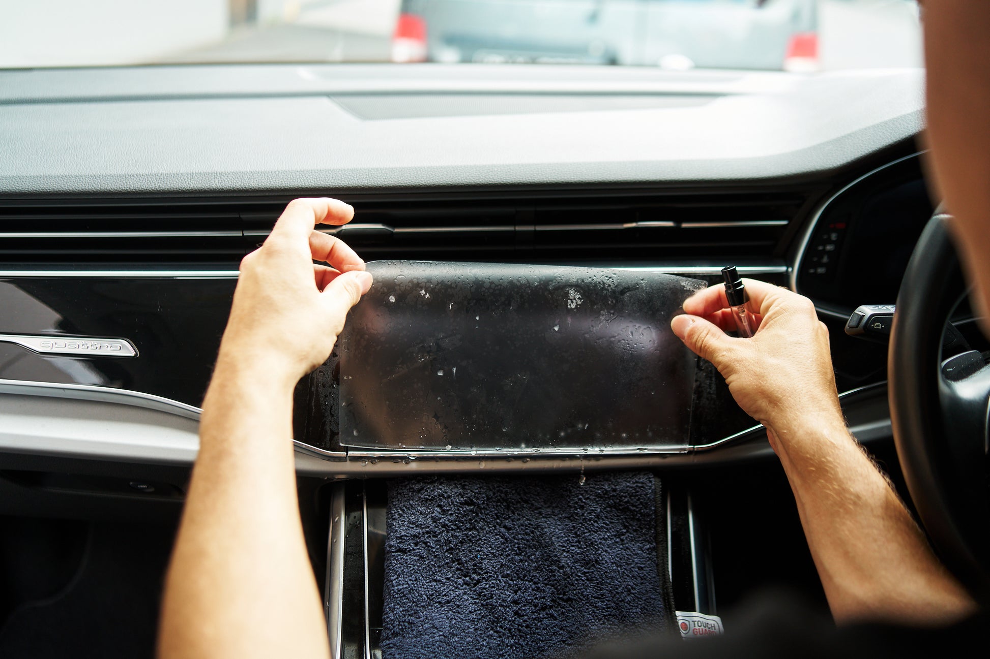 Car touchscreen infotainment screen protector with anti-glare, anti-fingerprint and scratch-resistant features.