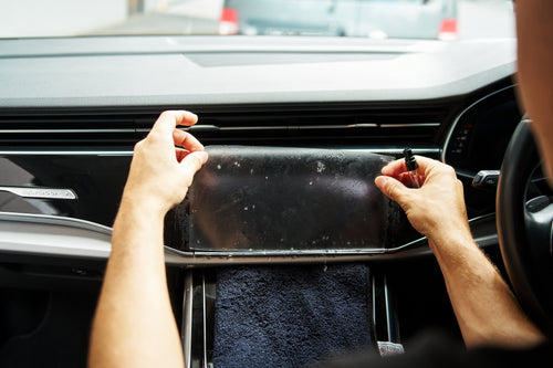 Car touchscreen infotainment screen protector with anti-glare, anti-fingerprint and scratch-resistant features.