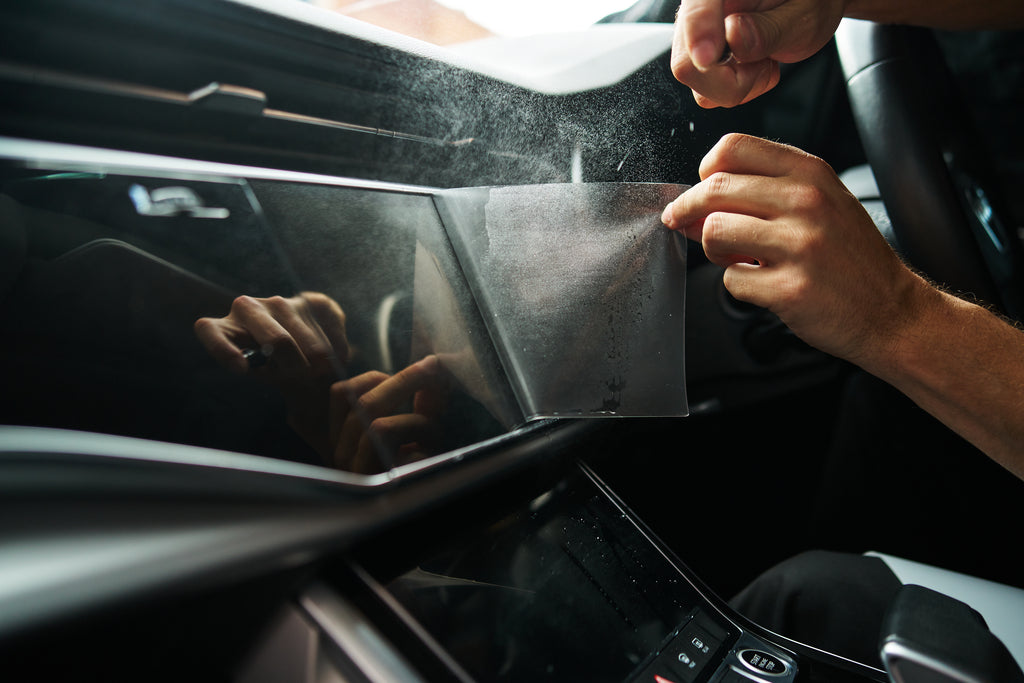 Car touchscreen infotainment screen protector with anti-glare, anti-fingerprint and scratch-resistant features.